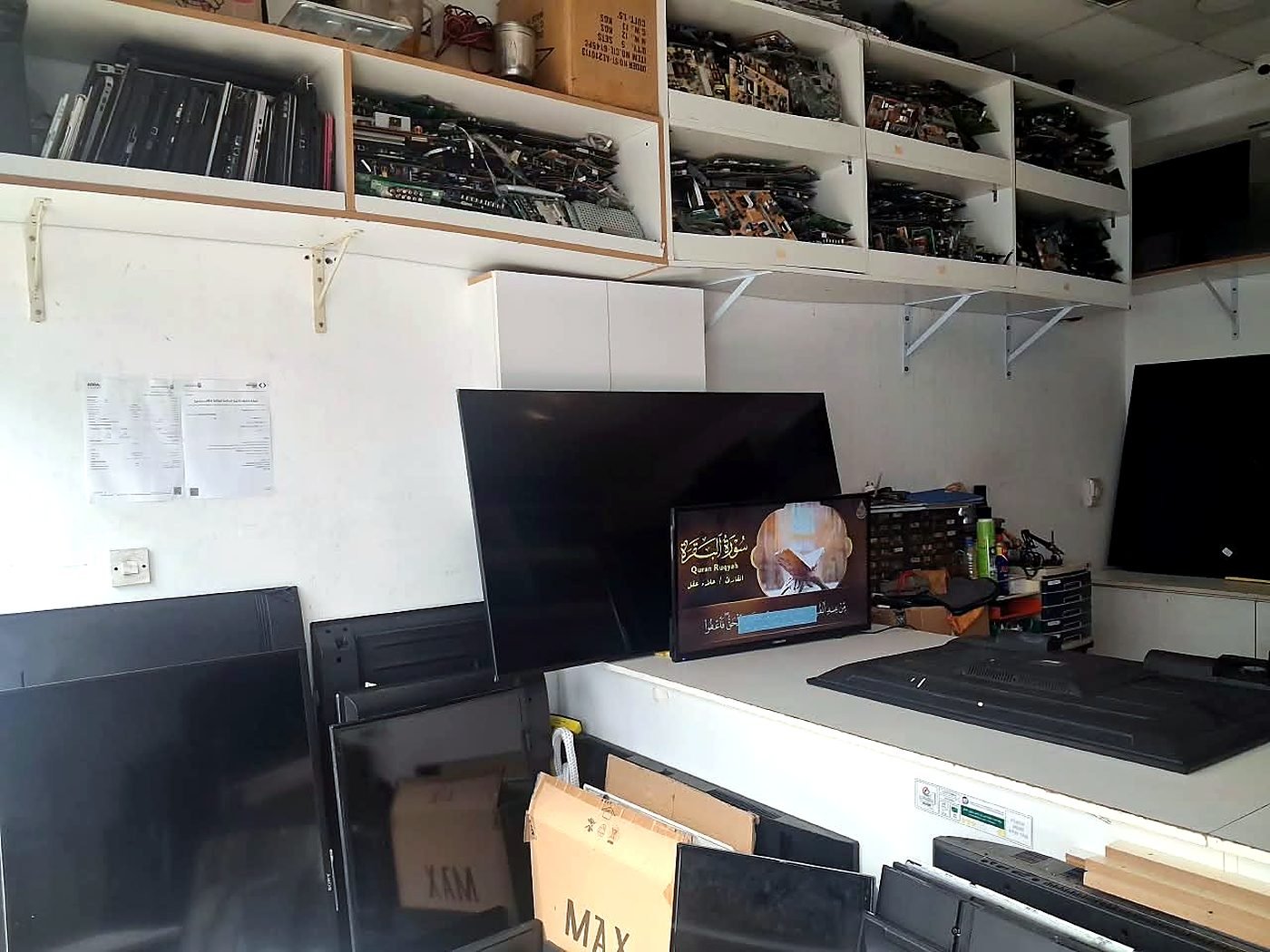 Shelves of spare boards and parts